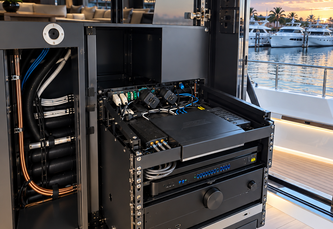 Cleanly dressed marine AV equipment rack with backlighting and vibration dampening